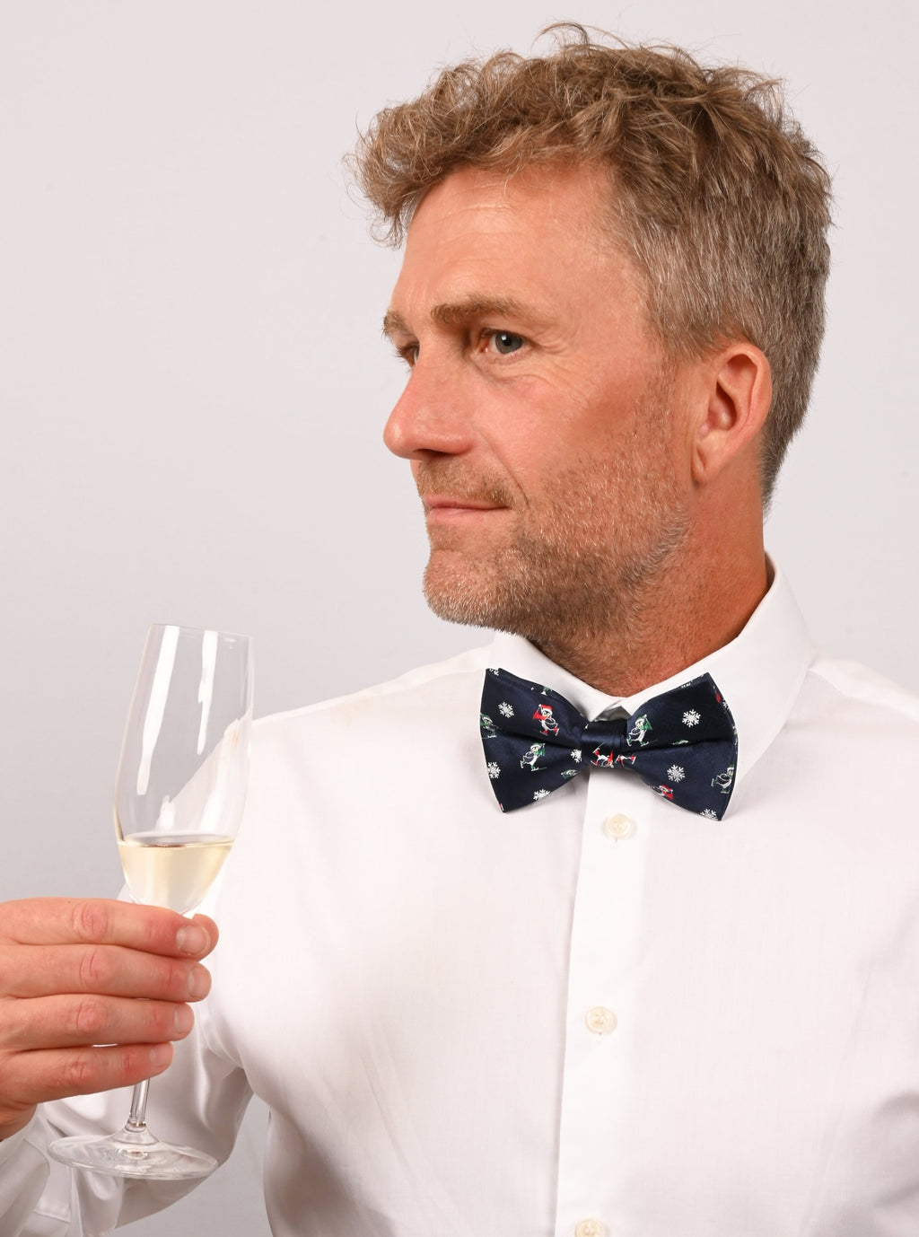 Christmas bow tie "Penguins on the ice rink"