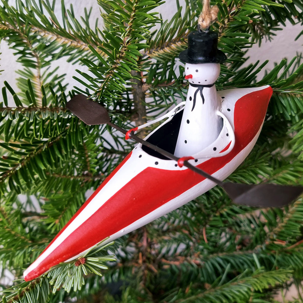 Snowman canoeing